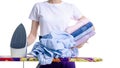 Woman ironing laundry clothing towels on iron board Royalty Free Stock Photo