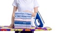 Woman ironing laundry on iron board Royalty Free Stock Photo