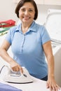 Woman Ironing Shirt Royalty Free Stock Photo