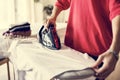 Woman ironing shirt at home Royalty Free Stock Photo