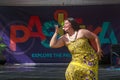 Polynesian woman and logo of Pasifika Festival, New Zealand