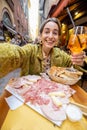 Woman with Italian food at outdoor bar Royalty Free Stock Photo
