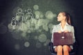 Woman in jacket, blouse sits on chair and looking Royalty Free Stock Photo