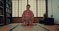 Woman, Japanese and spiritual wellness in traditional tatami room for zen culture, gratitude or ritual. Asian person Royalty Free Stock Photo