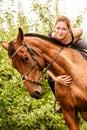 Woman jockey training riding horse. Sport activity Royalty Free Stock Photo