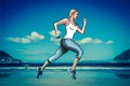 Woman jogging on beach vector