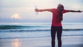 Woman jogging workout on the beach in the morning. Relax with the sea walk Royalty Free Stock Photo