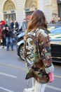 Woman with John Richmond green and brown camouflage shirt before John Richmond fashion show,