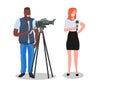 Woman journalist with camera man presenting live news operator filming reporter using video camera on tripod movie Royalty Free Stock Photo