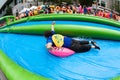 Woman Joyfully Rides Innertube Down Giant Water Slide In Atlanta Royalty Free Stock Photo