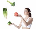 Woman juggle vegetable Royalty Free Stock Photo