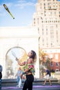 Woman Juggling with Pins, in the Middle of Greenwich Park in New Royalty Free Stock Photo