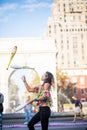 Woman Juggling with Pins, in the Middle of Greenwich Park in New Royalty Free Stock Photo