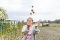 Woman juggling with potato