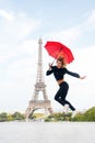 Woman jump with fashion umbrella. Happy woman travel in paris, france. Parisian isolated on white background. Girl with Royalty Free Stock Photo