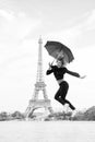 Woman jump with fashion umbrella. Happy woman travel in paris, france. Parisian isolated on white background. Girl with Royalty Free Stock Photo