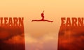 A woman jump between two cliffs. Royalty Free Stock Photo