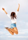 Woman, jumping and in air excited with travel, vacation of winner happy from holiday. Winning, African female person