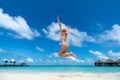 Woman Jumping In The Air On Tropical Beach Royalty Free Stock Photo