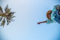 Woman jumping or crossing step over at beach