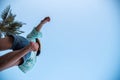 Woman jumping or crossing step over at beach Royalty Free Stock Photo