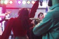 Woman jumping and dancing in club
