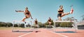 Woman, jumping and hurdles in competitive sports training, exercise or athletics on the stadium track. Women in sport Royalty Free Stock Photo