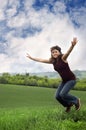 Woman jumping for joy Royalty Free Stock Photo