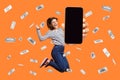 Woman jumping in money rain showing phone display with advertisement area, betting and winning. Royalty Free Stock Photo