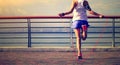 Woman jumping rope at seaside Royalty Free Stock Photo