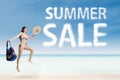 Woman jumping with summer sale cloud Royalty Free Stock Photo