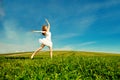 Woman jumping. Young beautiful girl jumping in field on the gra Royalty Free Stock Photo