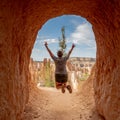 Woman Jumps In Tunnel In Bryce Canyon Royalty Free Stock Photo