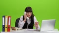 Woman is justified by boss by telephone. Green screen