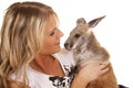 Woman with kangaroo close look at each other