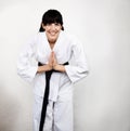 Woman, karate and bow in portrait, fight and self defense sport, muay thai and training with respect. Athlete, combat