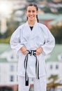 Woman, karate and smile in outdoor portrait with happiness for training, fitness and wellness in sunshine. Girl, martial