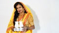 Woman with karwa sweets, Happy karva chauth festival. Indian young female holding sweets an occasion of women festival