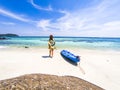 woman with a kayak on an beach in Andaman sea, Koh Lipe - solo travel