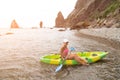 Woman kayak sea. Happy tourist enjoy taking picture outdoors for memories. Woman traveler posing in kayak canoe at sea Royalty Free Stock Photo