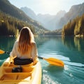 woman kayaking or canoeing on a flat water lake