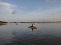 Woman kayaking in early morning in Bear Cut, Florida.