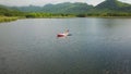 Woman kayaking on lake