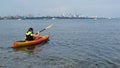 Woman kayaking on Lake Ontario near Toronto