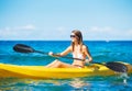 Woman Kayaking in the Ocean on Vacation Royalty Free Stock Photo