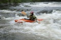 Woman kayaking in river