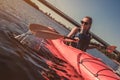 Woman kayaking on sunset Royalty Free Stock Photo