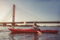 Woman kayaking on sunset Royalty Free Stock Photo