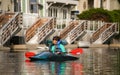 A woman kayaks in the Sparks Marina.