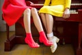 piano woman elegant key red colourful young legs fashion trend modern. Generative AI. Royalty Free Stock Photo